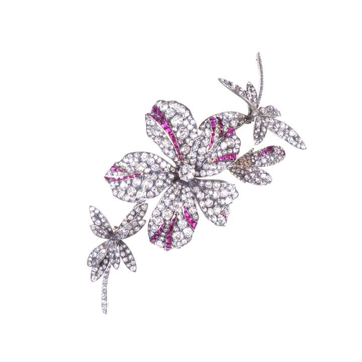 Diamond and ruby floral spray brooch by family repute of Belgian Royal provenance, the corsage centred by a principal five-petal flowerhead